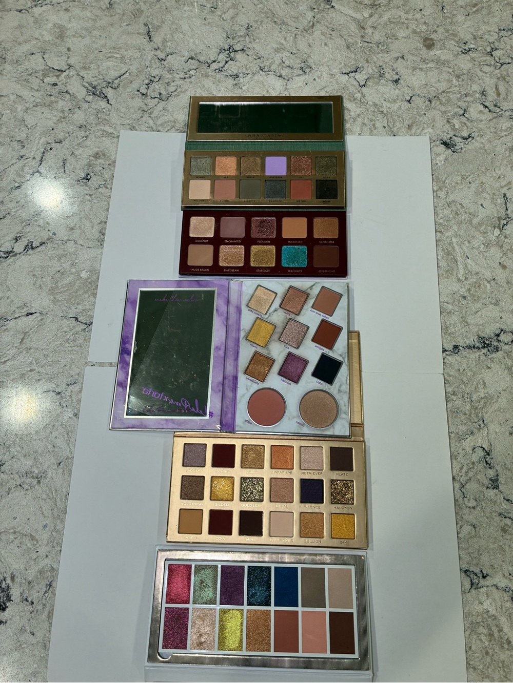 5 eyeshadow palettes ABH, Wander, Tarte, Revolution & KVD Beauty
